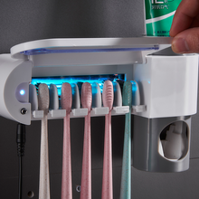 Load image into Gallery viewer, Antibacterial Ultraviolet Toothbrush Sterilizer Automatic Dispenser