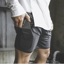 Load image into Gallery viewer, Men Double-Deck Fitness Bodybuilding Breathable Quick Drying Shorts.